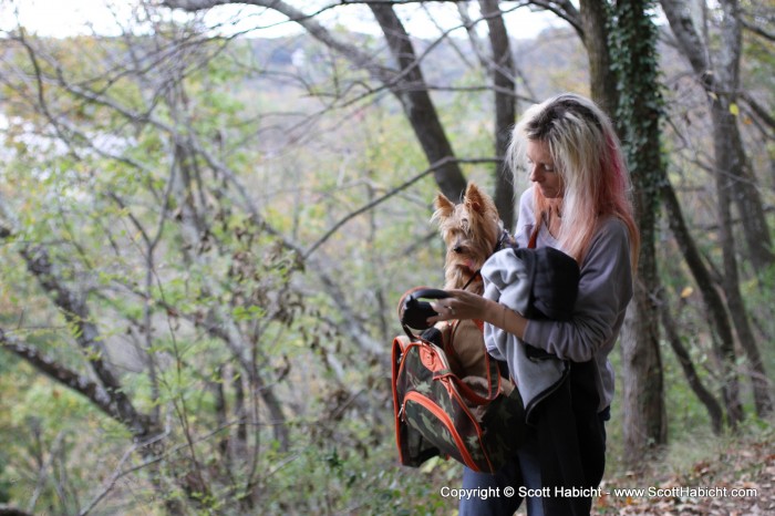 Riley was getting tired from all the walking, and Kelli carried him.