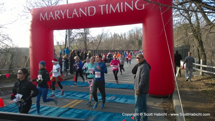 Kelli, crossing the finish line.