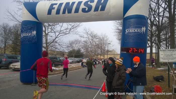 Kelli finishing a 5K.