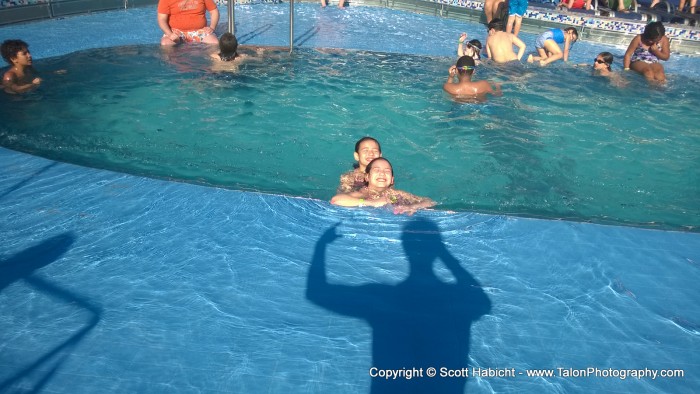 The kids were happy to be in the pool.