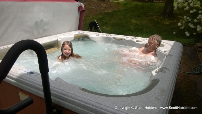 Amber and my father hanging out in the hot tub together.