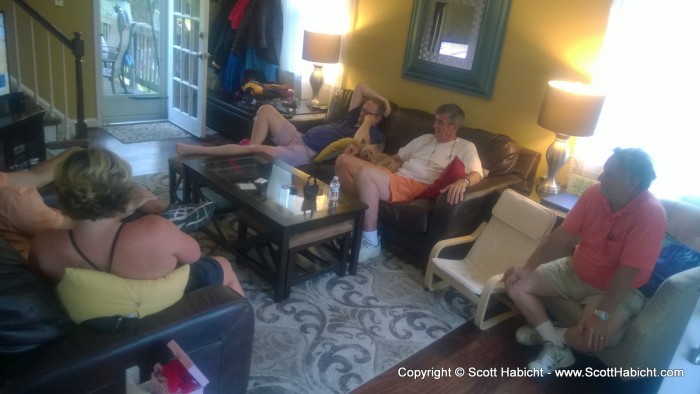 The adults watched golf.