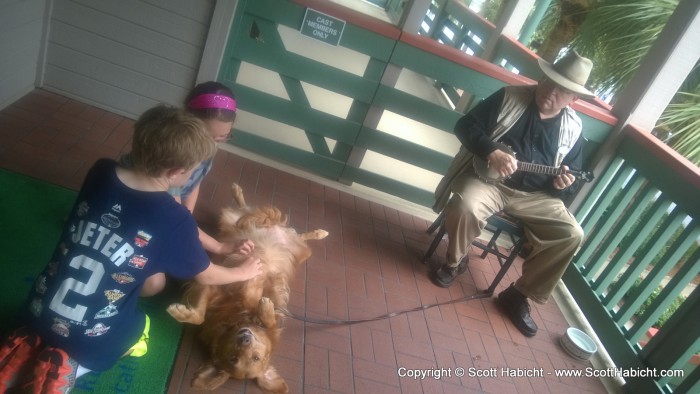 The resort had a mascot dog that all the kids loved to pet.