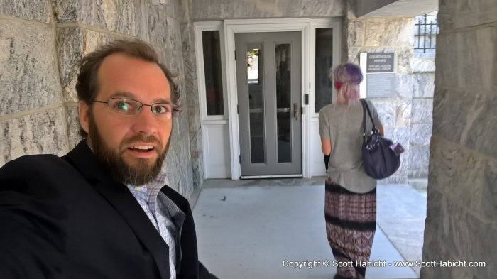 Kelli and I heading into the court house to get divorced. She heard the shutter and asked, "Did you just take a picture?"