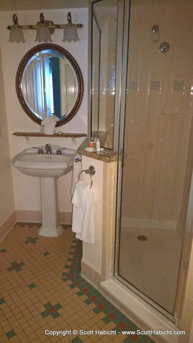 With a separate shower area.