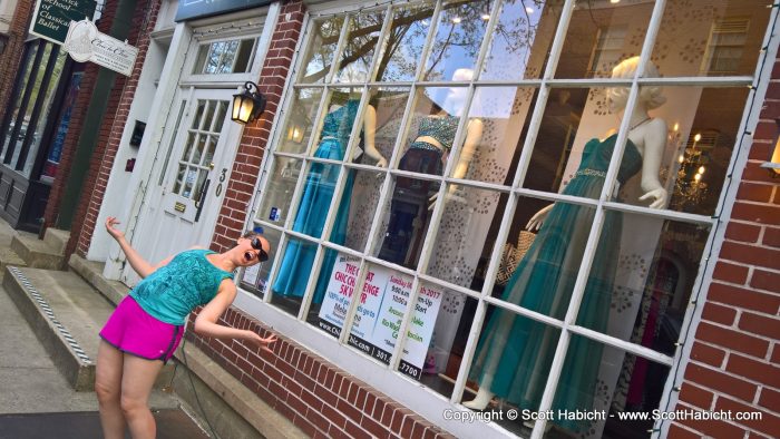 Molly, imitating the odd pose of the mannequins.