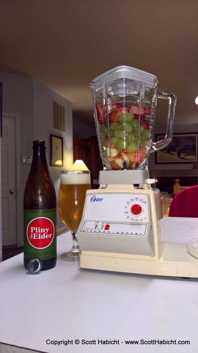 Enjoying a beer, and a fruit smoothie.