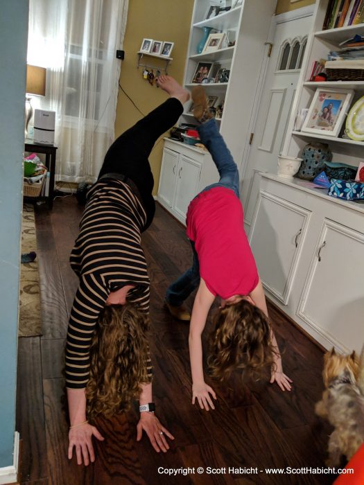 Back at the house, they were doing some silly yoga stuff.