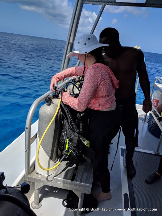 Back on the boat, she was learning how to switch tanks.