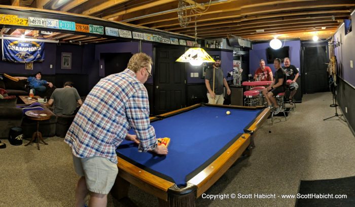 The guys hung out in the basement and waited for everyone to show up.