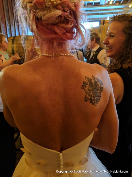 The back of Kelli's dress and hair.