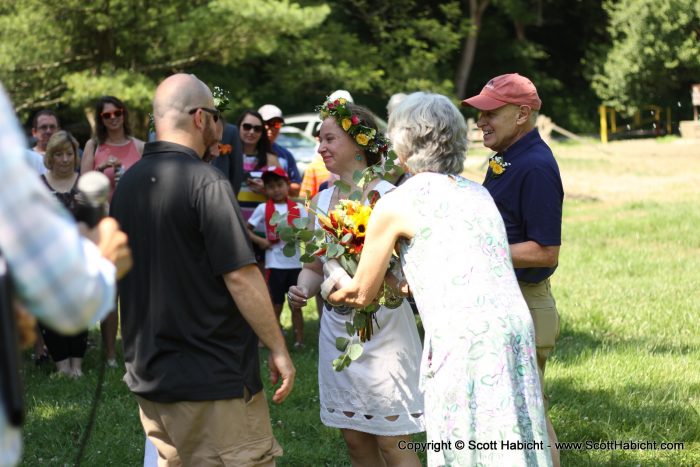 Her mother took her bouquet...