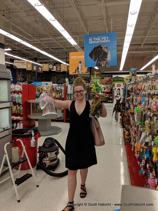 Molly happy with her purchases to refresh the fish tank.